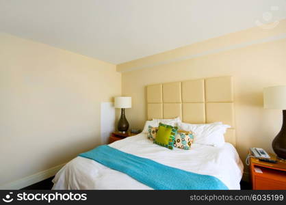 Double bed in the modern interior room