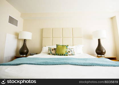 Double bed in the modern interior room