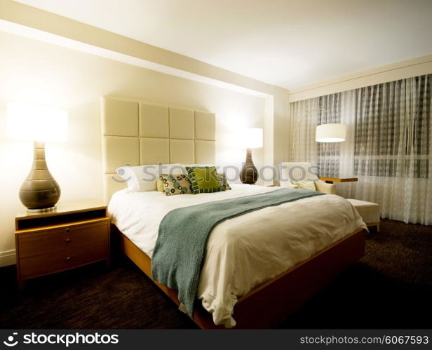 Double bed in the modern interior room