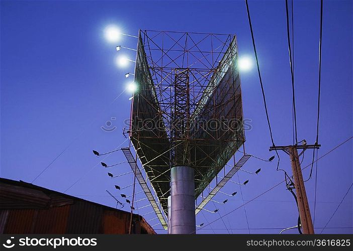 Double Billboard and Power Pole at Night