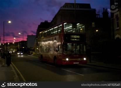 Double decker bus at night, Fulham, London