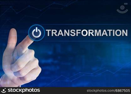 double exposure business hand clicking transformation button with blurred background