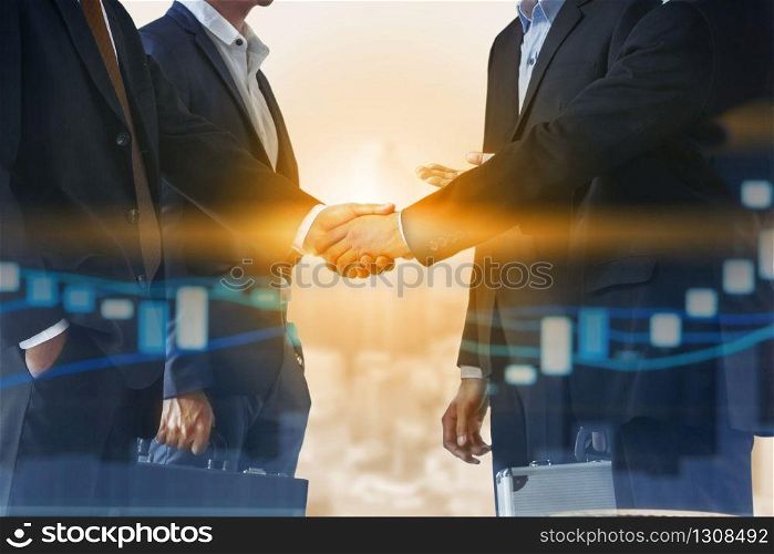 Double exposure business people handshake agreement with cityscape in background. Business executive meeting and collaboration.