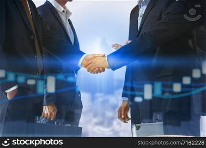 Double exposure business people handshake agreement with cityscape in background. Business executive meeting and collaboration.. Double exposure Business People Handshake Meeting