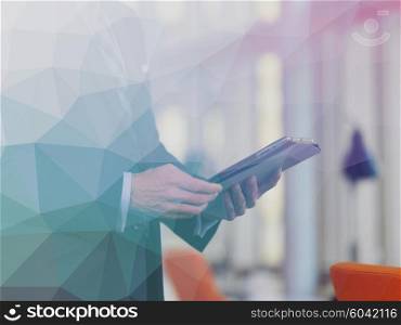 Double exposure design. Senior business man working on tablet computer at office