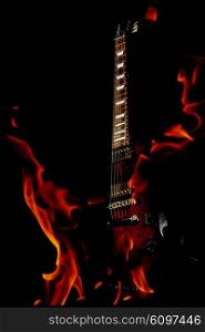double exposure electric guitar and fire