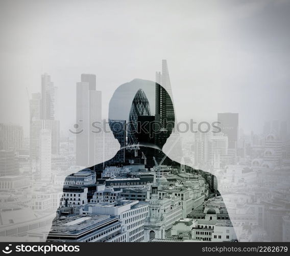 double exposure of back view of success businessman looking at london building as concept