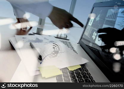 double exposure of business documents on office table with smart phone and digital tablet and stylus and two colleagues discussing data in the background