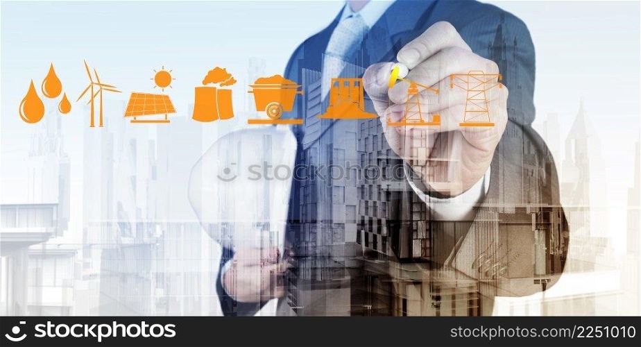 Double exposure of business engineer draw icon of indistry and abstract city as concept