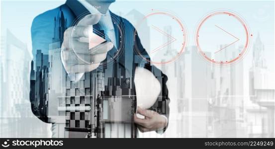 Double exposure of business engineer press play button sign to start or initiate projects and abstract city