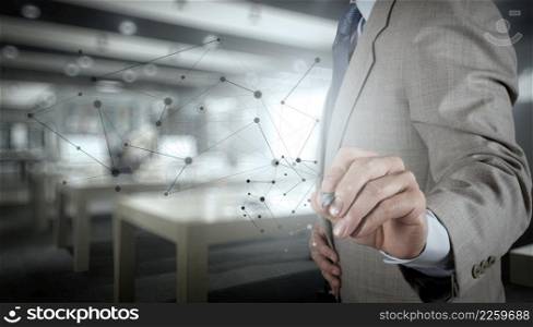Double exposure of business hand working with new modern computer show social network structure and bokeh exposure