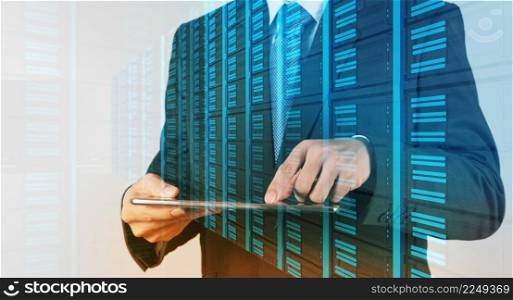 Double exposure of businessman hand pressing a touchscreen button on server background