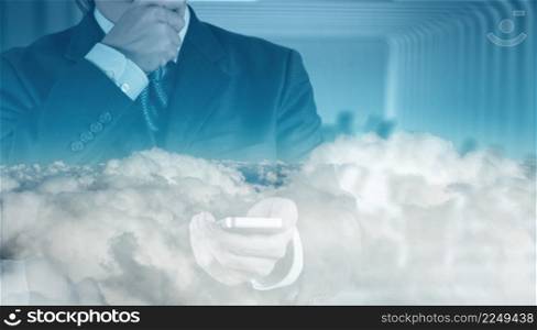 Double exposure of businessman hand with cloud as concept