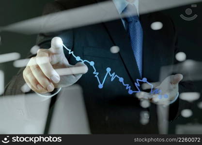 Double exposure of businessman hand working with new modern computer and business strategy as concept