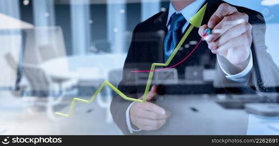 double exposure of businessman hand working with new modern computer and business strategy as concept