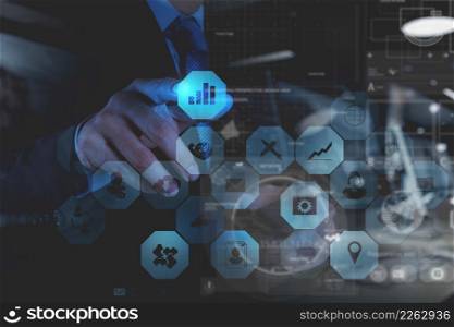 double exposure of businessman hand working with new modern computer and business strategy as concept