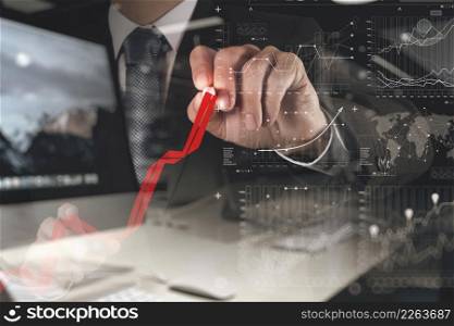 double exposure of businessman hand working with new modern computer and business strategy as concept