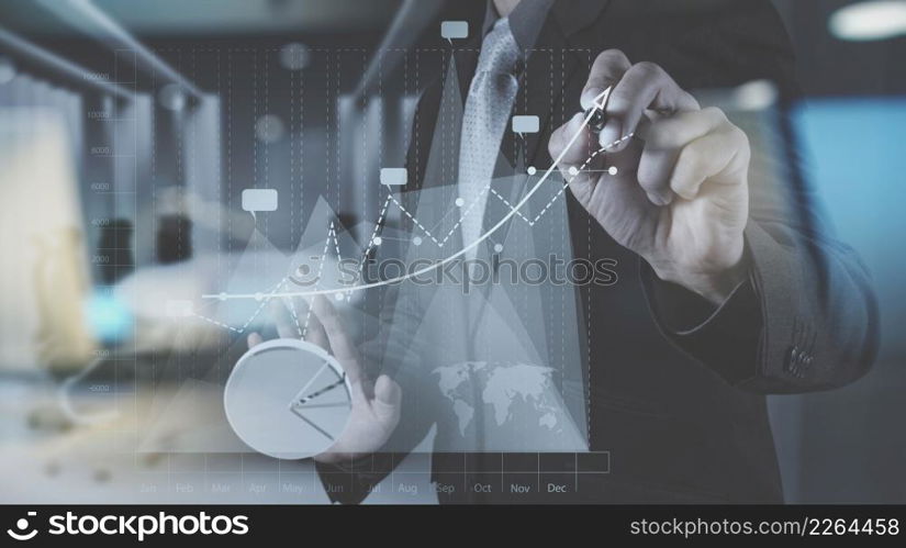 double exposure of businessman hand working with new modern computer and business strategy as concept