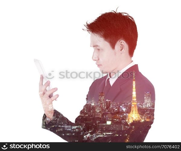 Double exposure of businessman using the tablet against the city isolated on white background
