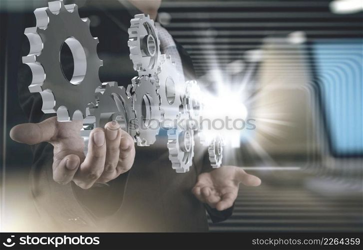 double exposure of businessman working with blue light gear to success as concept