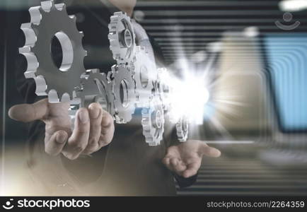 double exposure of businessman working with blue light gear to success as concept