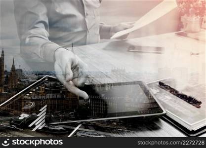 Double exposure of businessman working with digital tablet computer and smart phone and laptop computer with financial business strategy layer effect,London architecture buldings