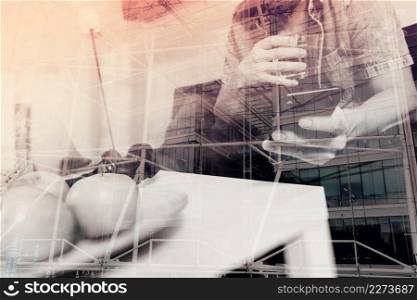 double exposure of designer man hand using mobile payments online shopping,omni channel,drinking water,sitting on sofa in living room,green apples in wooden tray,London city buildings