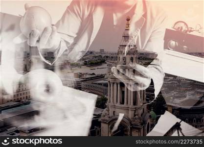 double exposure of hipster hand using smart phone for mobile payments online business,sitting on sofa in living room,holding green apple in wooden tray,London architecture city