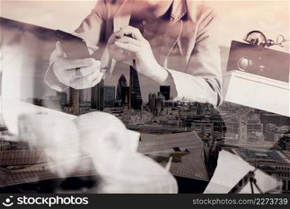 double exposure of hipster hand using smart phone for mobile payments online business,sitting on sofa in living room,holding green apple in wooden tray,London architecture city