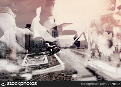 double exposure of man hand using VOIP headset with smart phone and digital tablet computer as call center and customer service help desk and vase flowers on wooden table,London buildings city