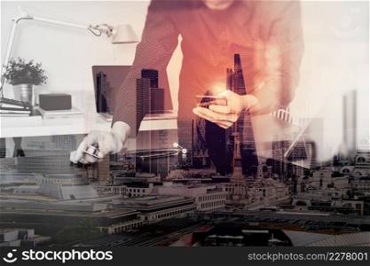 double exposure of Medical technology concept. Doctor hand working with smart phone,laptop,modern digital tablet dock screen computer in modern clinic office room,London architecture city