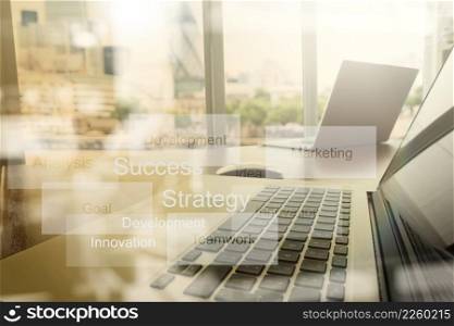 double exposure of new modern laptop computer with businessman hand working and business strategy as concept