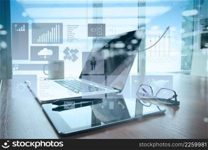 double exposure of Office workplace with laptop and smart phone on wood table with eyeglasses on digital tablet