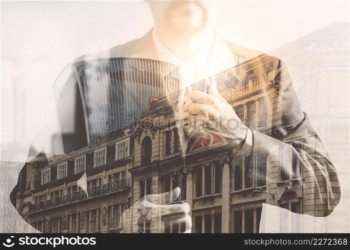 Double exposure of success businessman holding neck tie with London building,Bigben,front view,filter effect