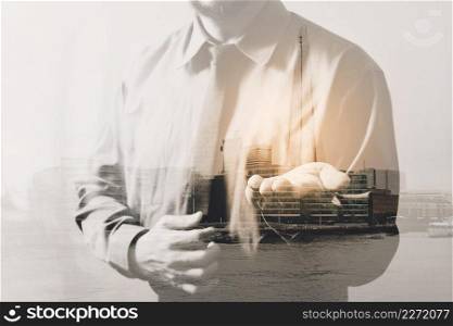 Double exposure of success businessman open his hand with London building,city,river,front view,filter effect