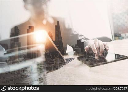 Double exposure of success businessman working in office with digital tablet laptop computer with London building and smart phone,filter effect