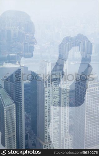 Double exposure of young woman taking picture over cityscape