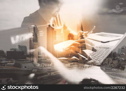 Double exposure,StartUp Programming Team. Website designer working digital tablet dock keyboard and computer laptop with smart phone and compact server
