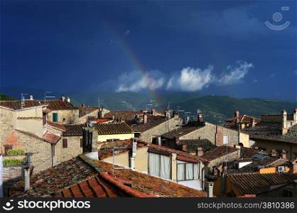Double rainbow in the sky after the rain. Cortona, Tuscany, Italy