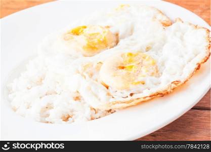 Double star eggs topped on rice up close