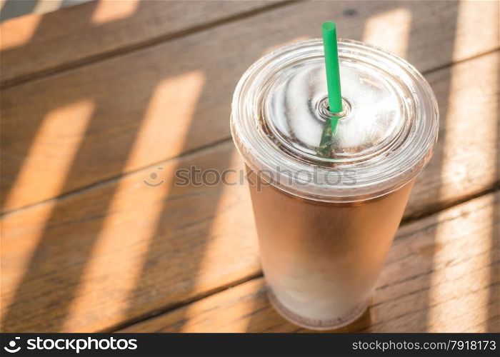 Double wall glass of iced coffee latte, stock photo