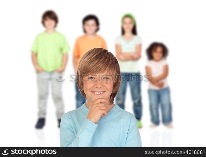 Doubtfully teenager boy with other children of bakcgrund unfocused