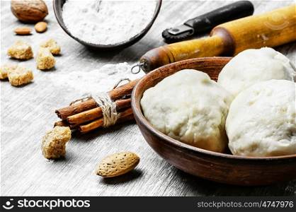 dough with flour and rolling pin