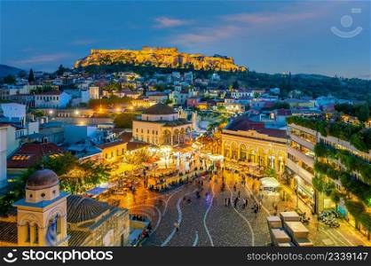 Downtown Athens city skyline, cityscape with The Acropolis and the Parthenon Temple in Greece at sunset from Monastiraki Square
