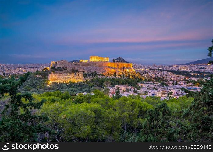Downtown Athens city skyline, cityscape with The Acropolis and the Parthenon Temple in Greece at sunset