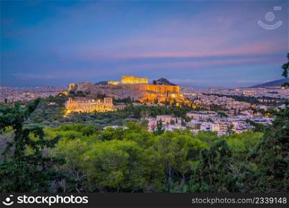Downtown Athens city skyline, cityscape with The Acropolis and the Parthenon Temple in Greece at sunset