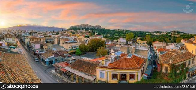 Downtown Athens city skyline, cityscape with The Acropolis and the Parthenon Temple  in Greece at sunset