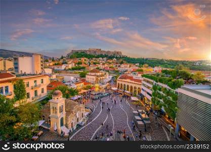Downtown Athens city skyline, cityscape with The Acropolis and the Parthenon Temple in Greece at sunset from Monastiraki Square