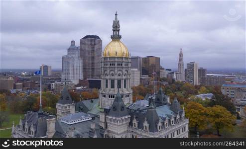 Downtown buildings under a dark sky at the Connecticut state capitol building in Hartford