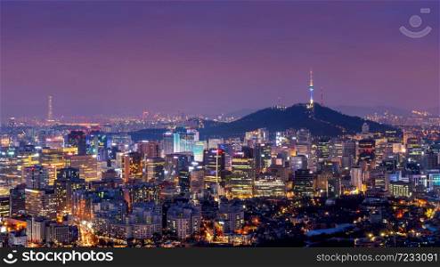 Downtown cityscape at night in Seoul, South Korea.